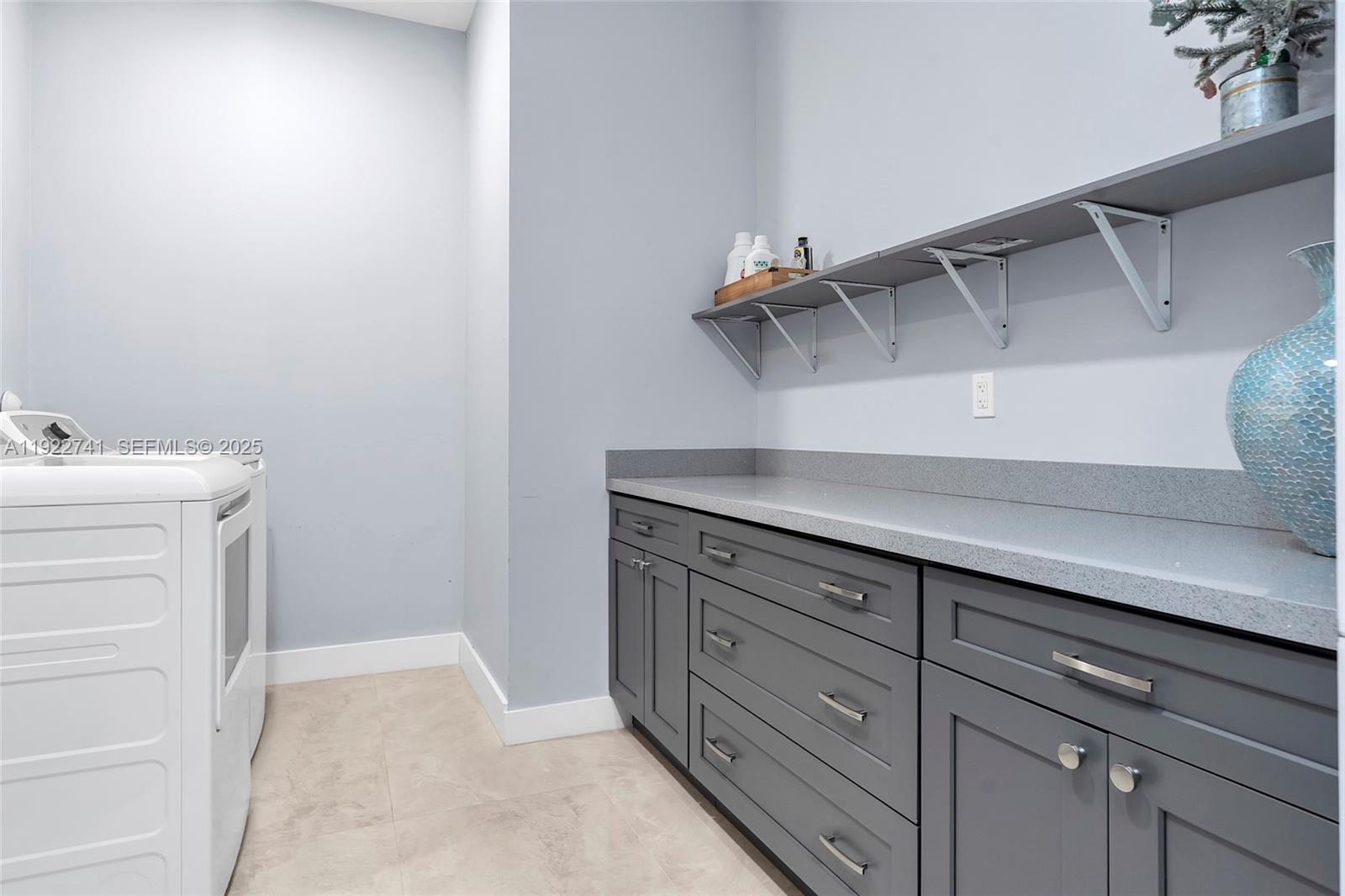15701 Southwest 254th Street Homestead, FL 33031 - Photo 36 of 50 a view of a storage and utility room with closet
