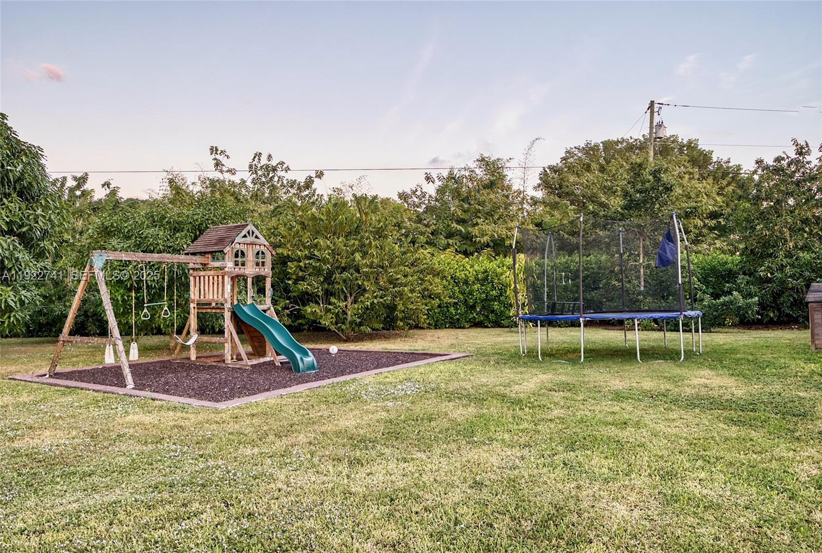 15701 Southwest 254th Street Homestead, FL 33031 - Photo 50 of 50 a view of a park with a slide