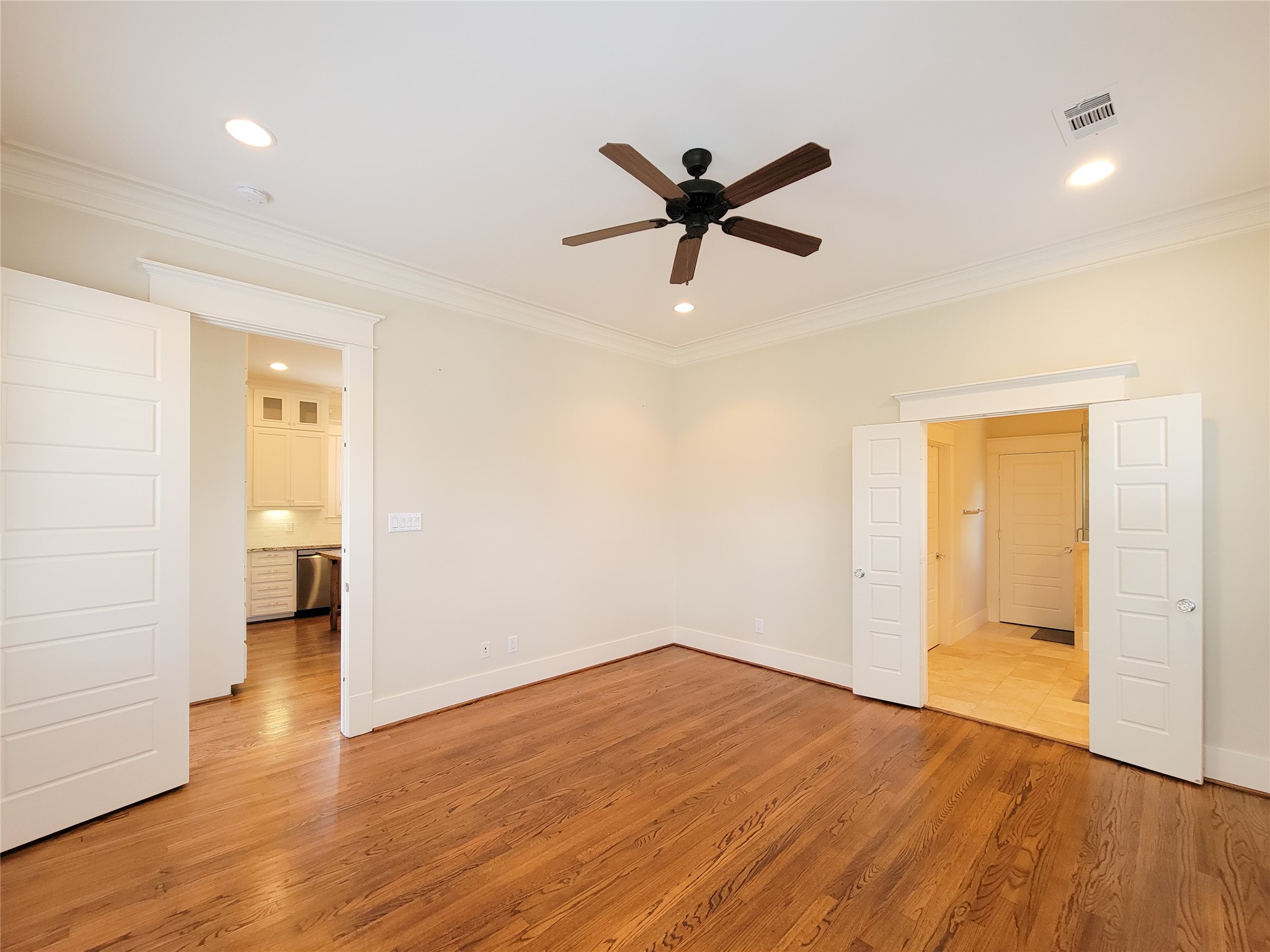 1140 West Cottage Street Houston, TX 77009 - Photo 25 of 37 a view of a room with wooden floor and white walls