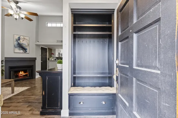 a bathroom with a tub and a fireplace