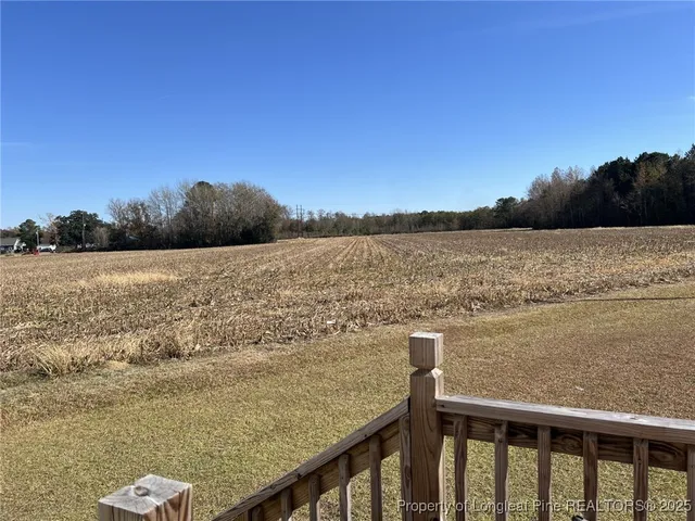 a view of a lake from a balcony