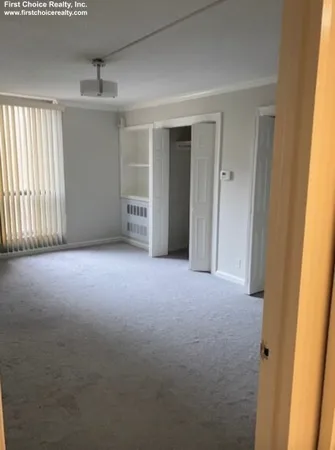 a kitchen with a refrigerator stove and sink
