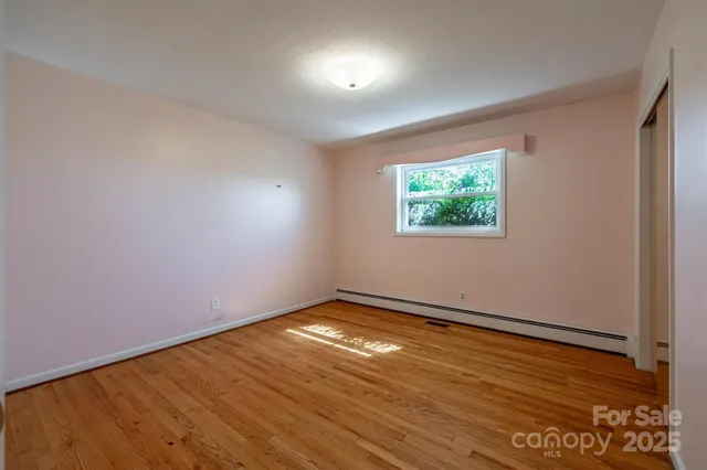 a bathroom with a sink double vanity and a mirror