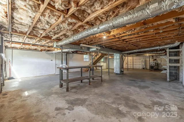 a bathroom with a toilet sink and shower