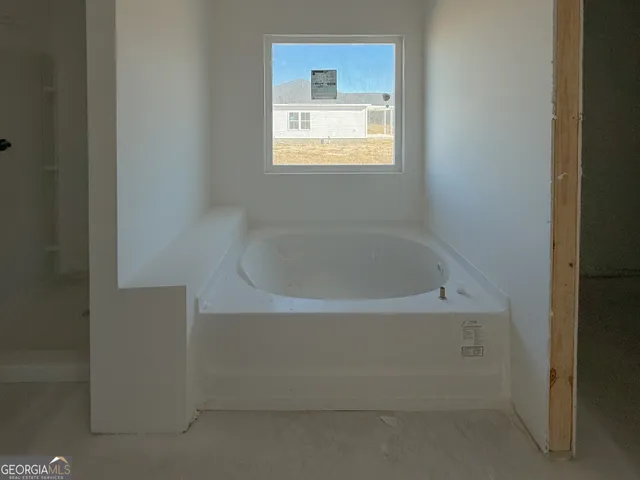 a bathroom with a bathtub