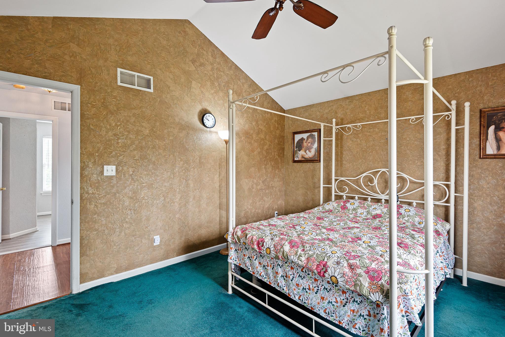 3 Kerrin Road Bear, DE 19701 - Photo 20 of 25 a bedroom with a bed and a chandelier