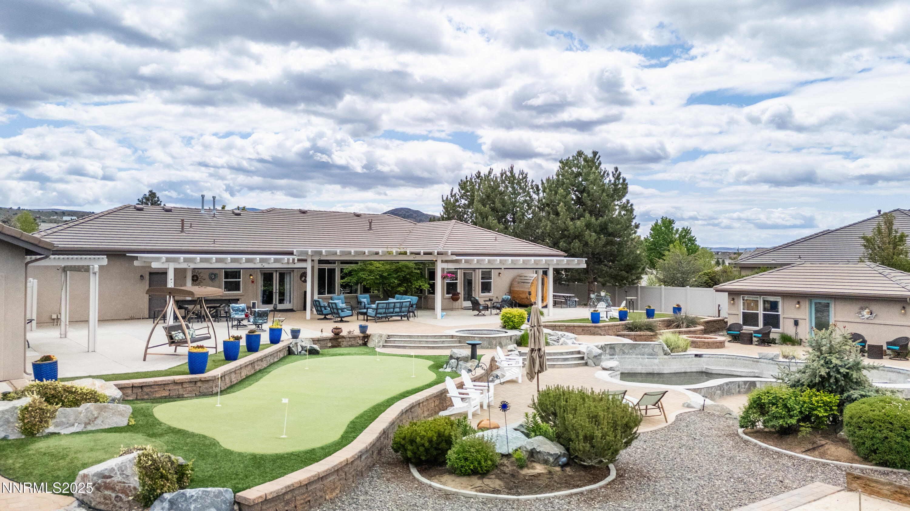 11645 Anthem Drive Sparks, NV 89441 - Photo 31 of 45 Backyard Drone Putting