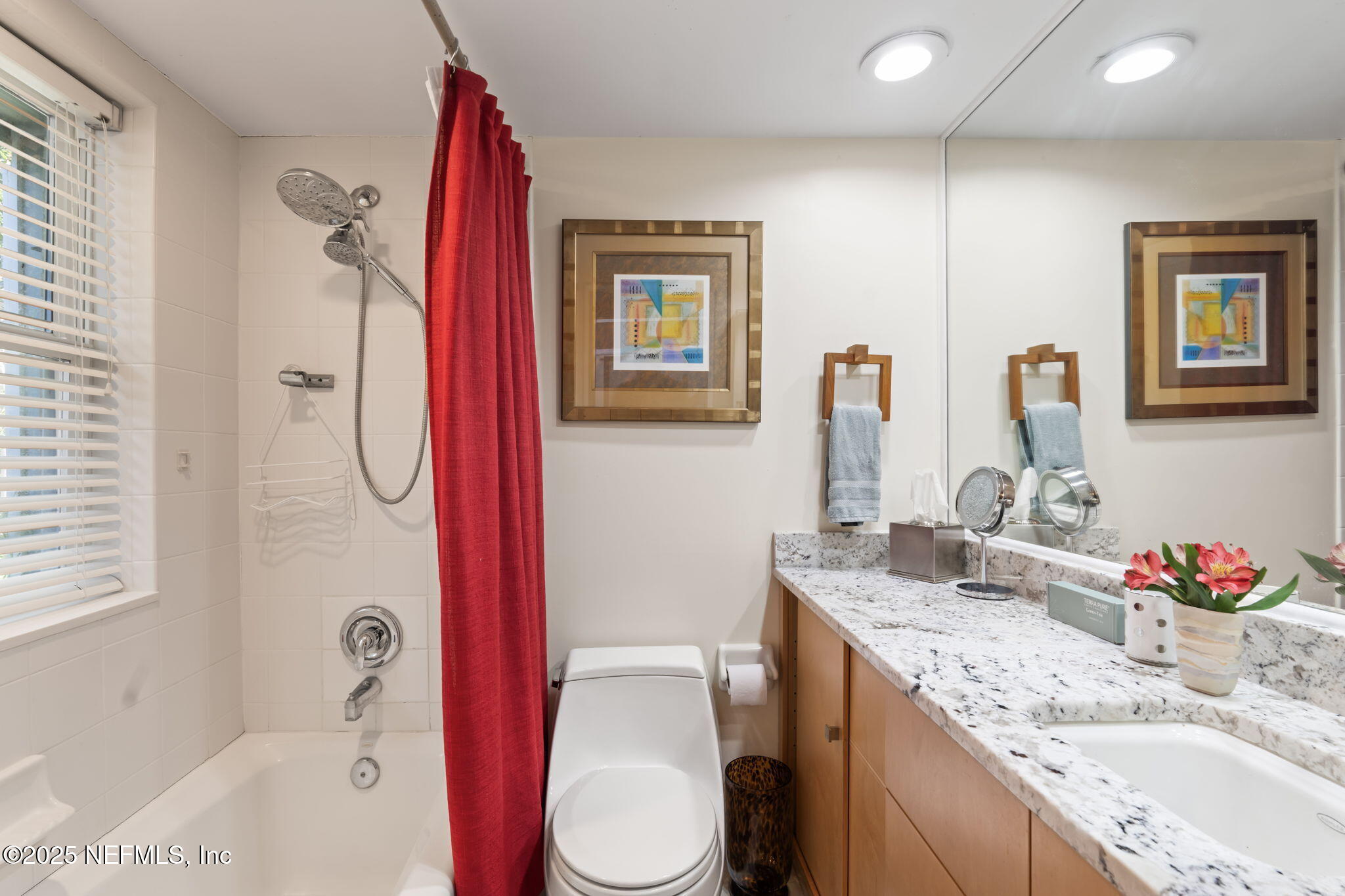 2337 Seminole Road, Unit B Atlantic Beach, FL 32233 - Photo 15 of 19 a bathroom with a granite countertop sink toilet and shower