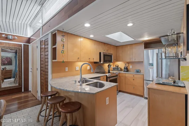 a kitchen with a stove and a microwave