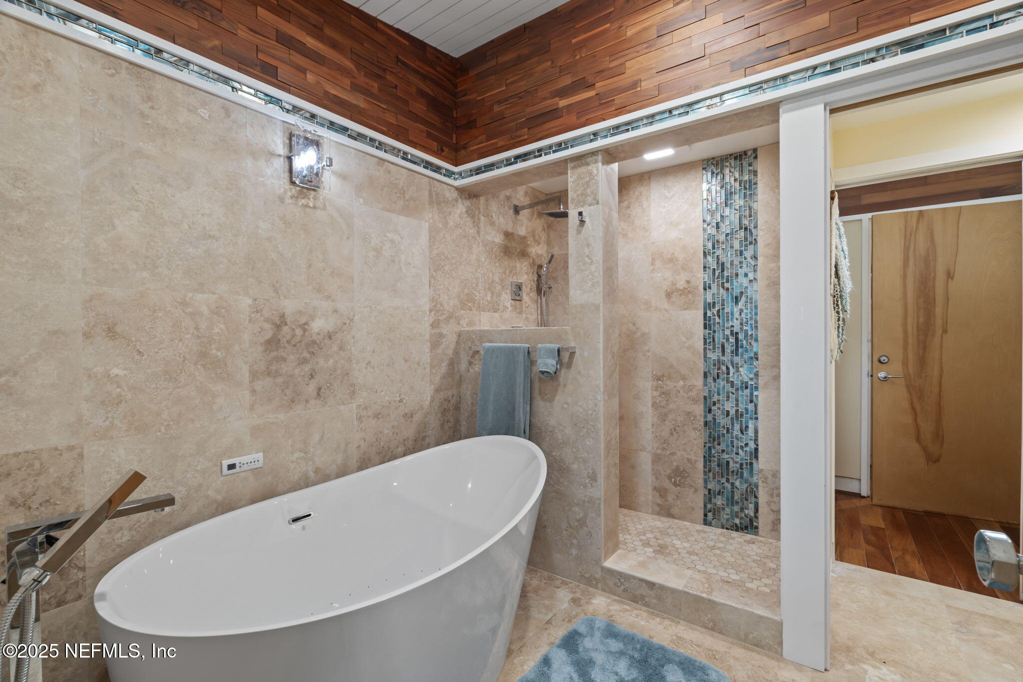 2337 Seminole Road, Unit B Atlantic Beach, FL 32233 - Photo 10 of 19 a bathroom with a tub and shower