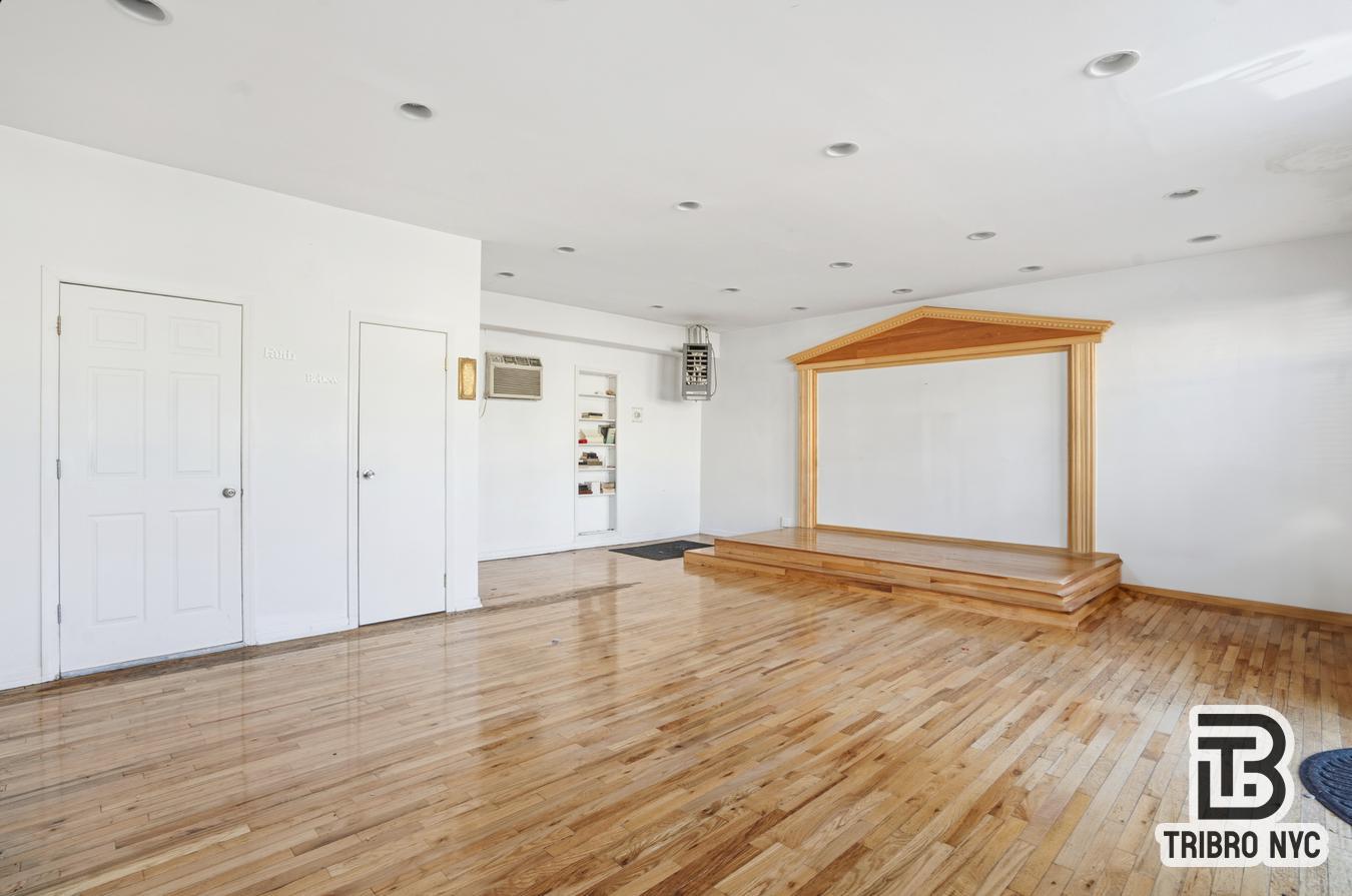 348 East 110th Street, Unit RETAIL Manhattan, NY 10029 - Photo 4 of 11 a view of an empty room with wooden floor