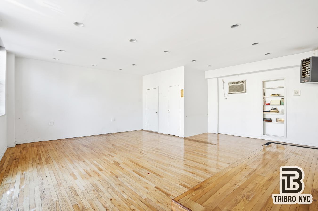 348 East 110th Street, Unit RETAIL Manhattan, NY 10029 - Photo 6 of 11 a view of empty room with wooden floor