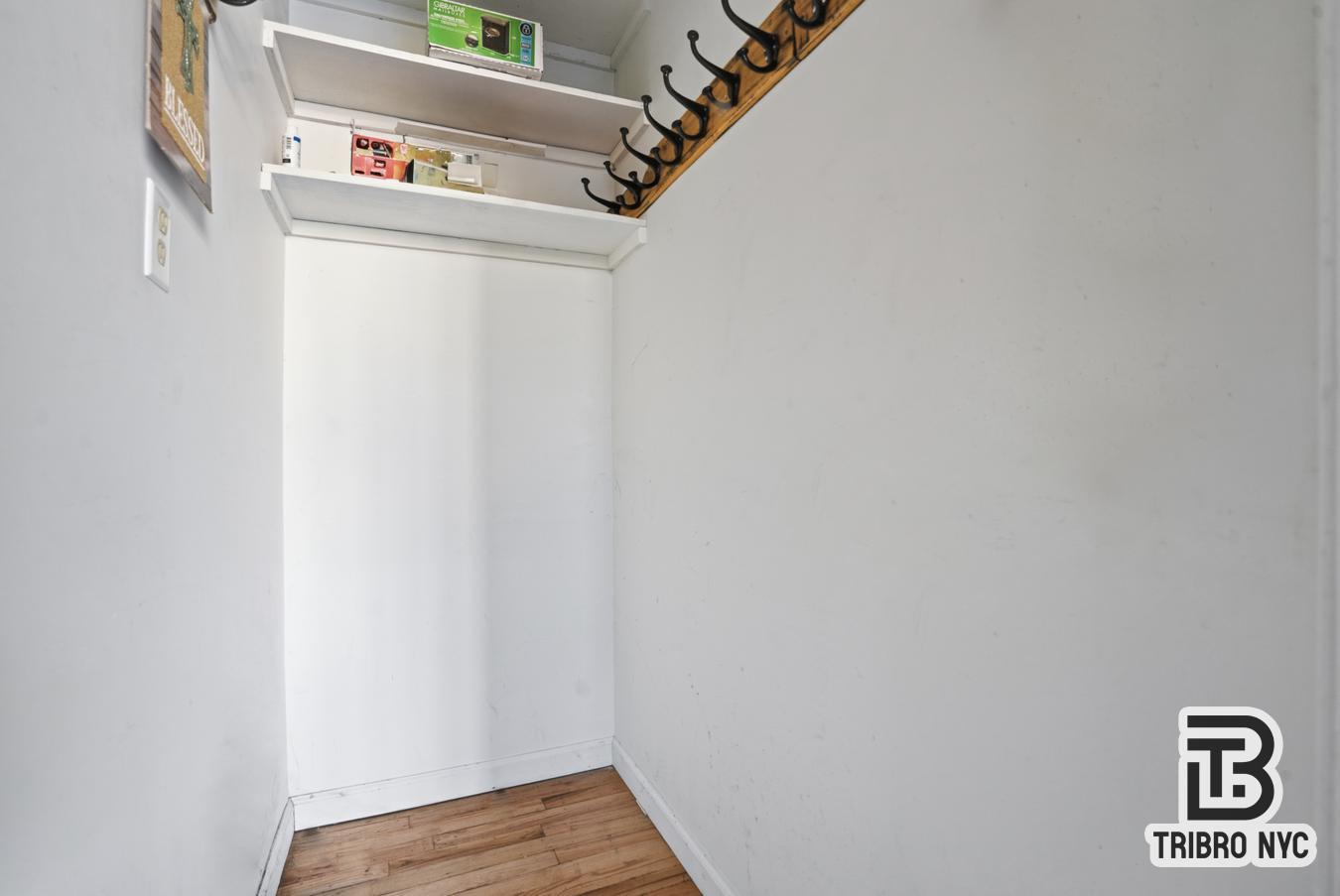 348 East 110th Street, Unit RETAIL Manhattan, NY 10029 - Photo 10 of 11 a view of a hallway with wooden floor