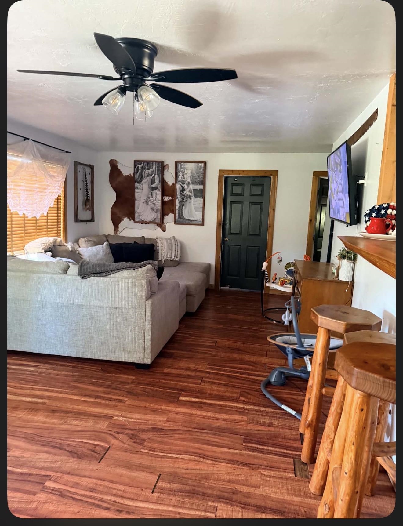 15440 Old Wagon Road Crescent Mills, CA 95934 - Photo 7 of 19 a living room with furniture and a wooden floor