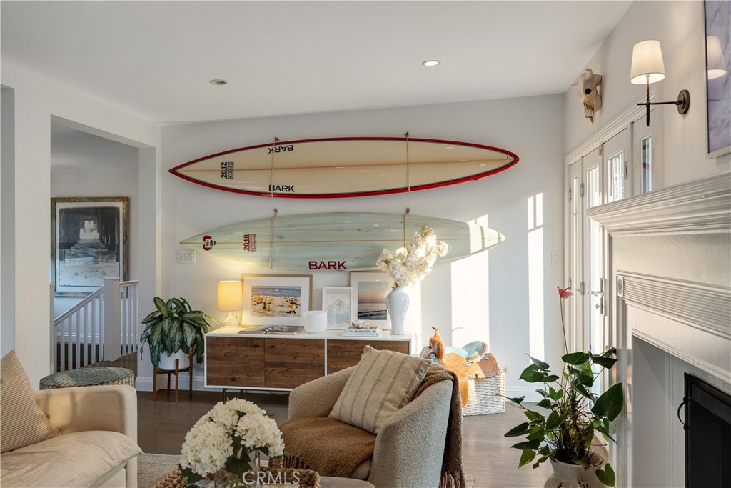 1006 Ave H Redondo Beach, CA 90277 - Photo 17 of 75 a living room with furniture and a chandelier