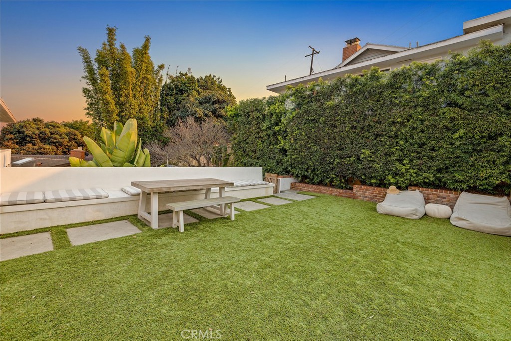 1006 Ave H Redondo Beach, CA 90277 - Photo 26 of 75 a lawn chairs sitting in the middle of a field