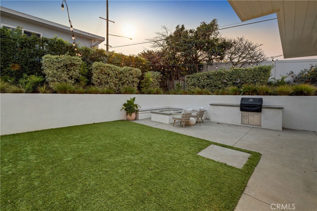 1006 Ave H Redondo Beach, CA 90277 - Photo 27 of 75 a view of a terrace with a garden and seating area