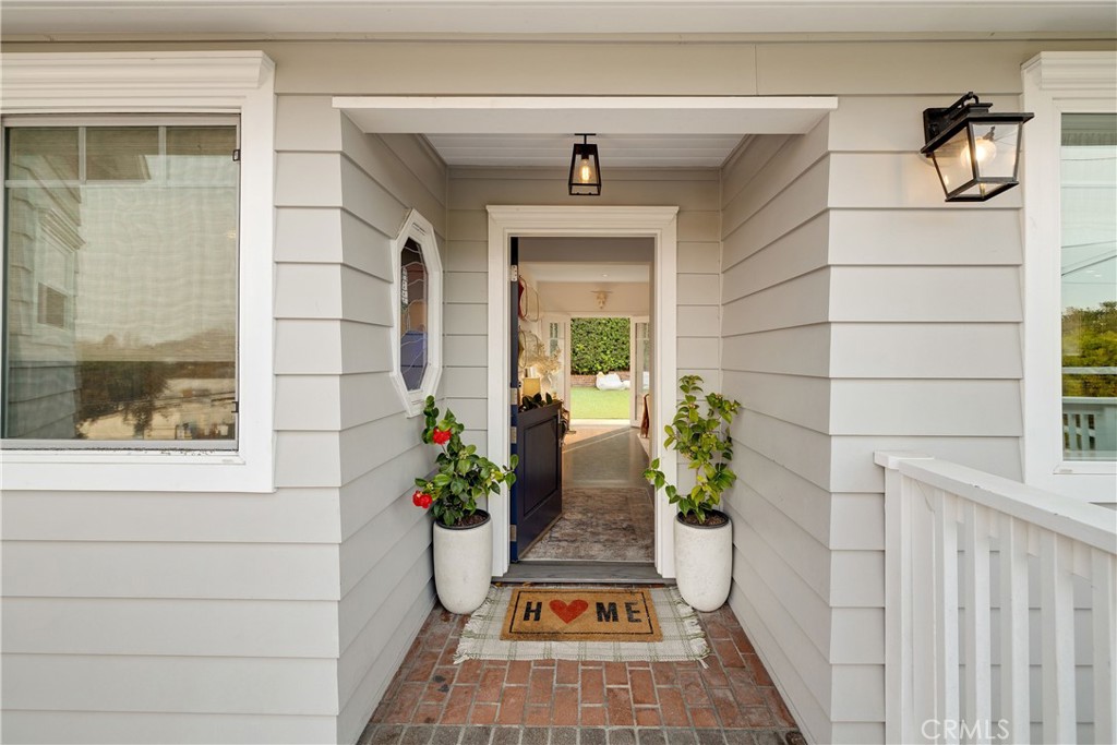 1006 Ave H Redondo Beach, CA 90277 - Photo 4 of 75 a potted plant sitting in front of a door