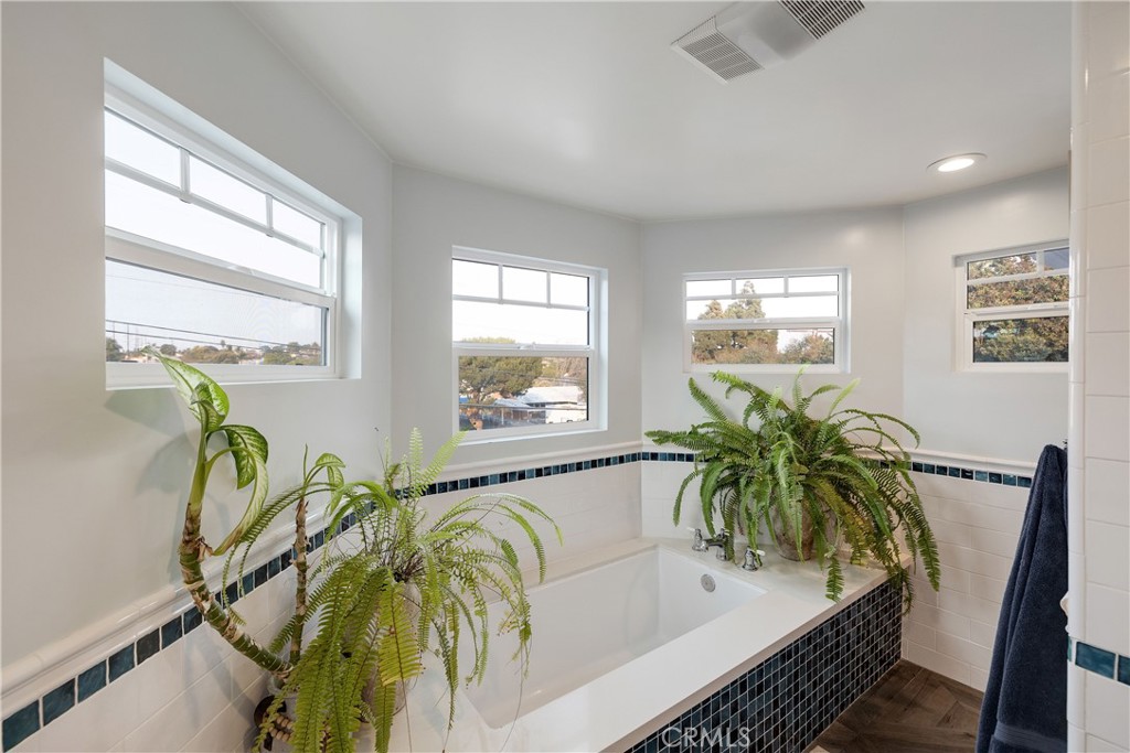 1006 Ave H Redondo Beach, CA 90277 - Photo 46 of 75 a living room with furniture and a potted plant
