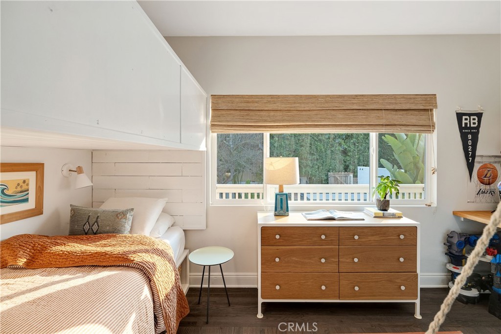 1006 Ave H Redondo Beach, CA 90277 - Photo 49 of 75 a bedroom with a bed and large windows