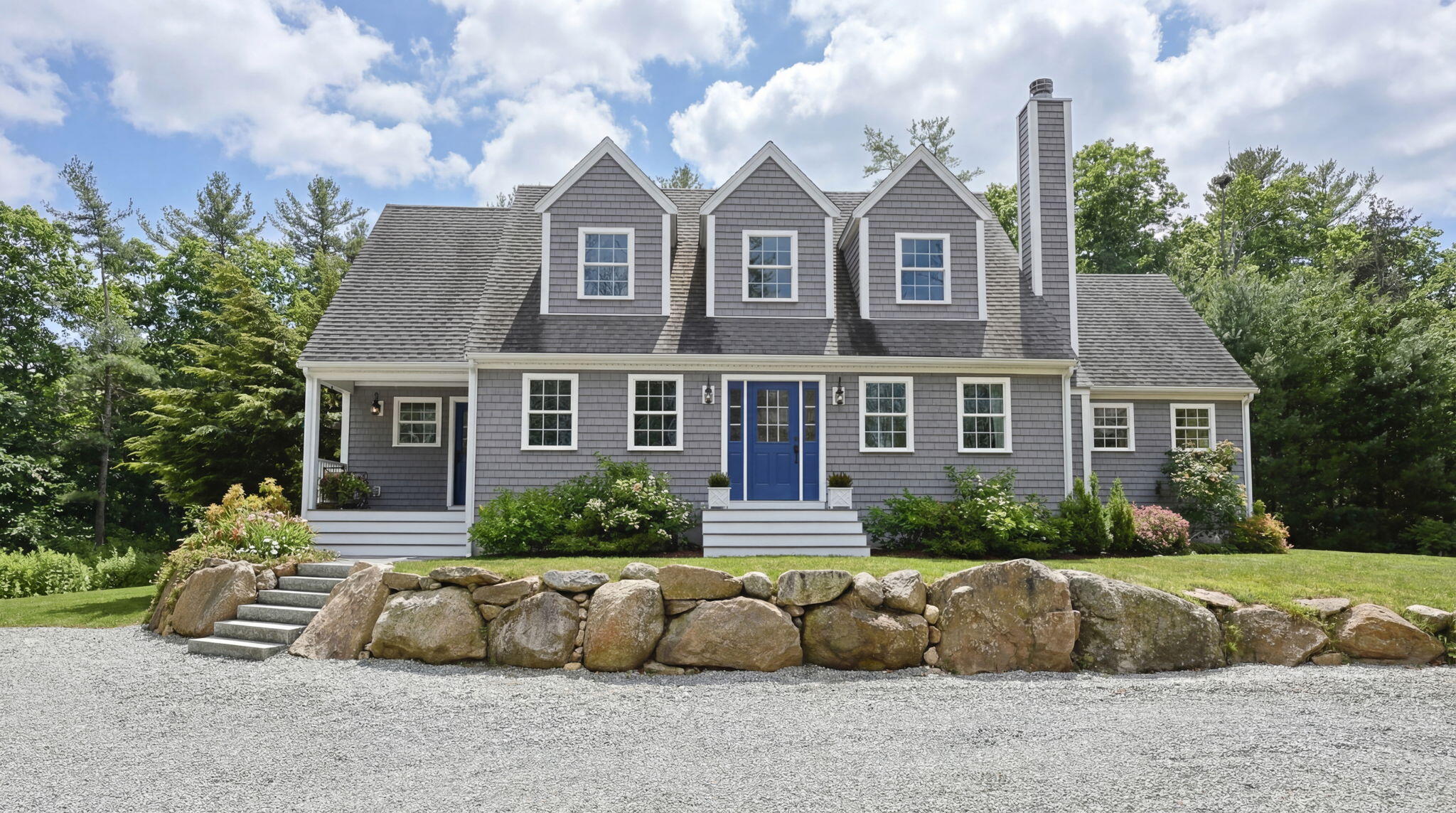 174 Cross Neck Road Marion, MA 02738 - Photo 1 of 41 a front view of a house with a garden