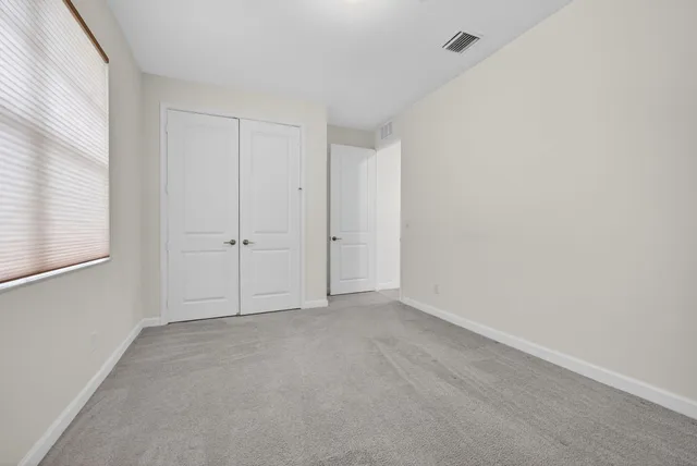 a bathroom with a toilet and a bathtub