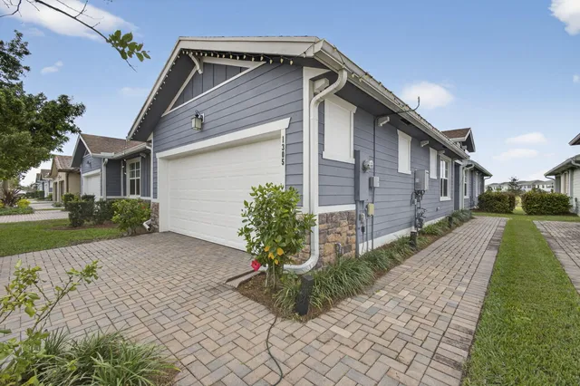 a house with garden in front of it