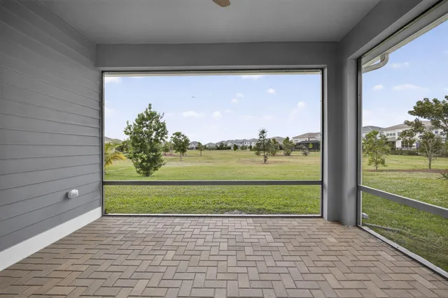 a view of a lake and a yard