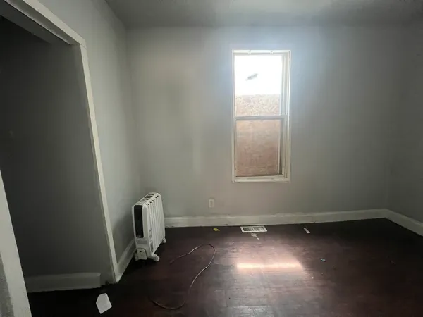 an empty room with a window
