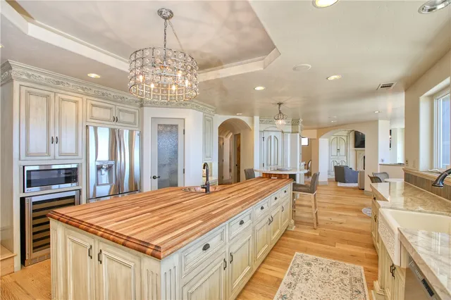 a living room with fireplace furniture and a flat screen tv