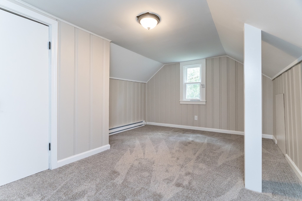 39 Ambrose Street Springfield, MA 01109 - Photo 14 of 23 an empty room with windows and closet