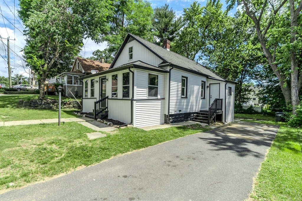 39 Ambrose Street Springfield, MA 01109 - Photo 21 of 23 a front view of house with yard and green space