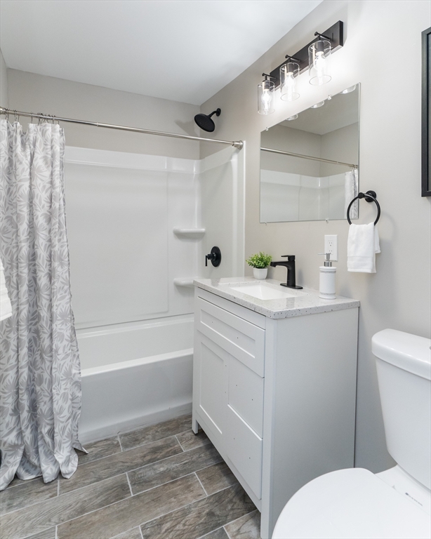 39 Ambrose Street Springfield, MA 01109 - Photo 8 of 23 a bathroom with a sink a toilet and a bathtub