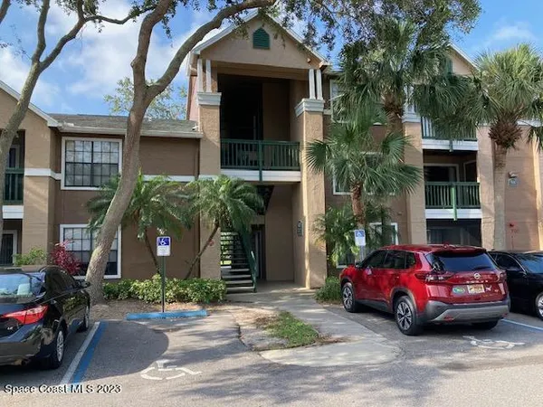 a car parked in front of a house