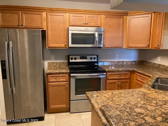7667 North Wickham Road, Unit 502 Melbourne, FL 32940 - Photo 12 of 19 Kitchen2