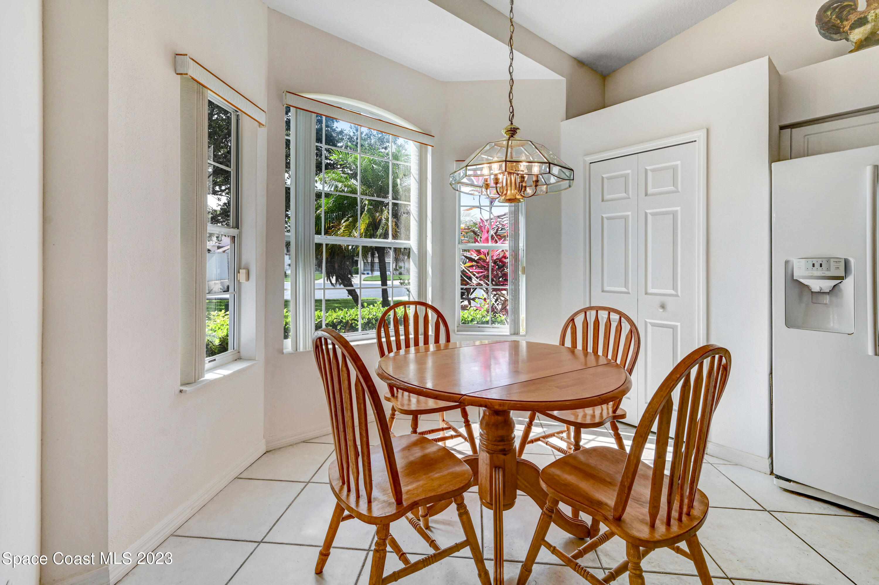 368 Renaissance Avenue Melbourne, FL 32940 - Photo 13 of 29 a view of a dining room with furniture window and outside view
