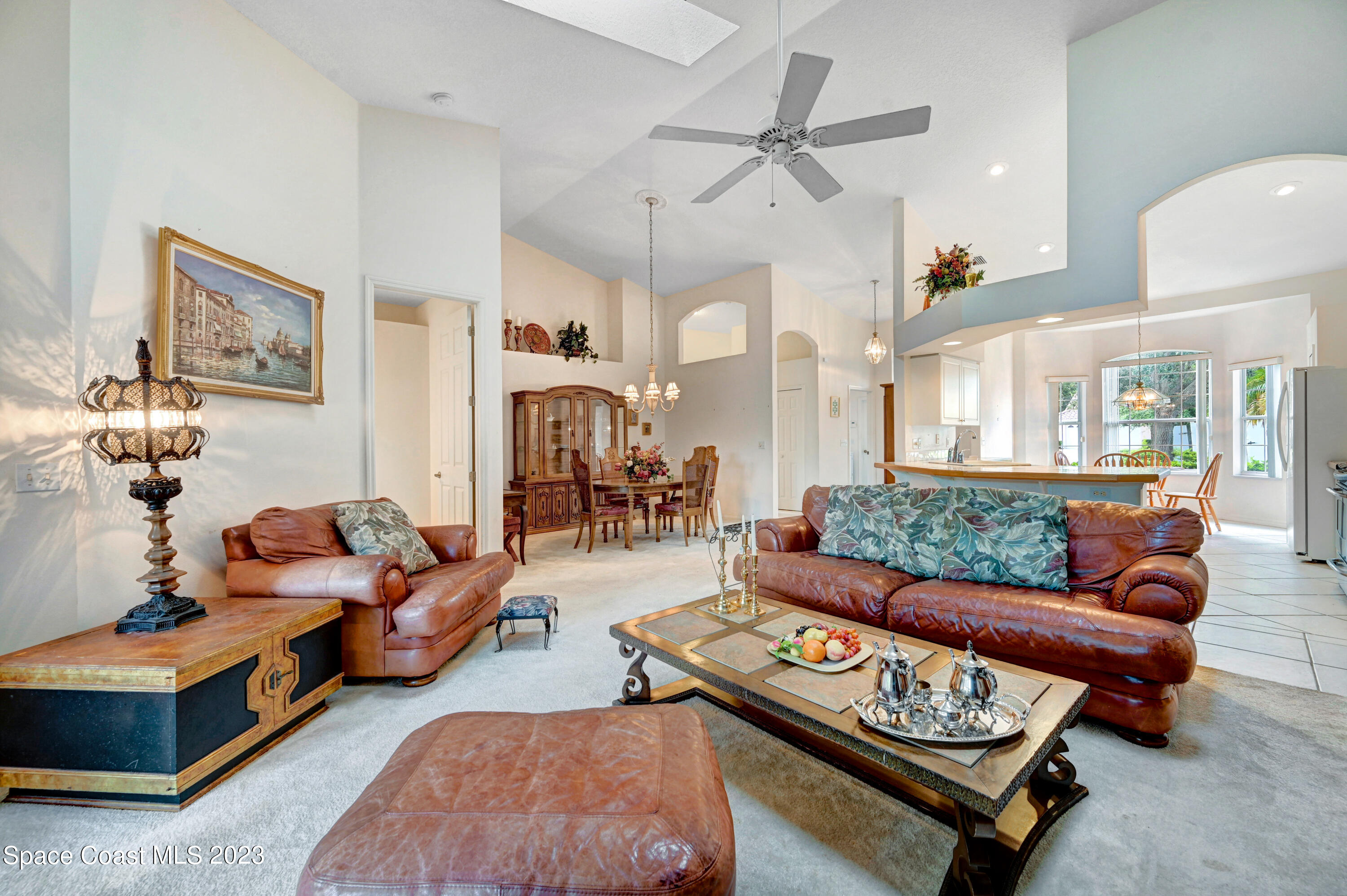 368 Renaissance Avenue Melbourne, FL 32940 - Photo 8 of 29 a living room with furniture and wooden floor