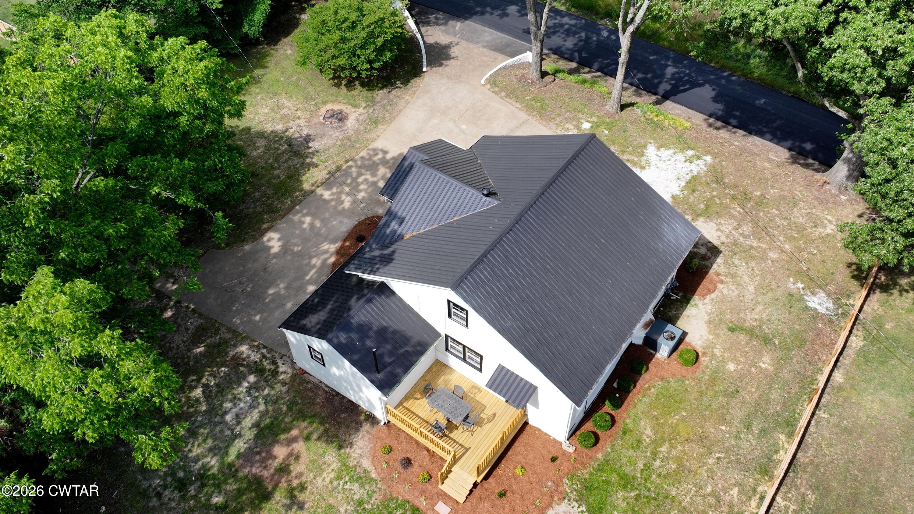 16 Manner Frank Road Milan, TN 38358 - Photo 6 of 25 an aerial view of house with yard