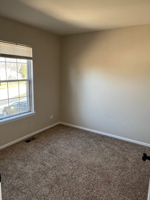 1842 Shetland Road Naperville, IL 60565 - Photo 26 of 30 an empty room with a window