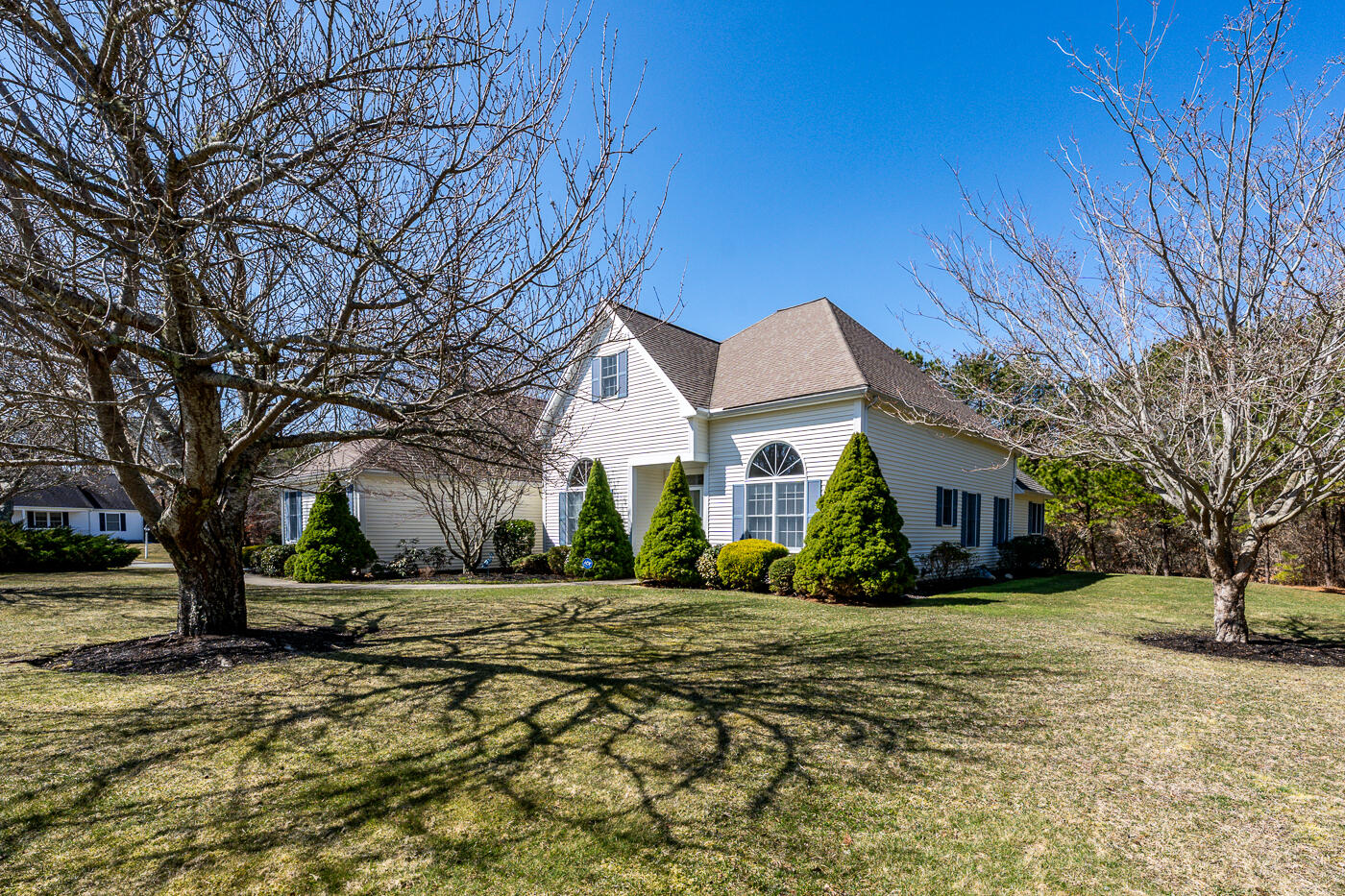 a view of house with yard