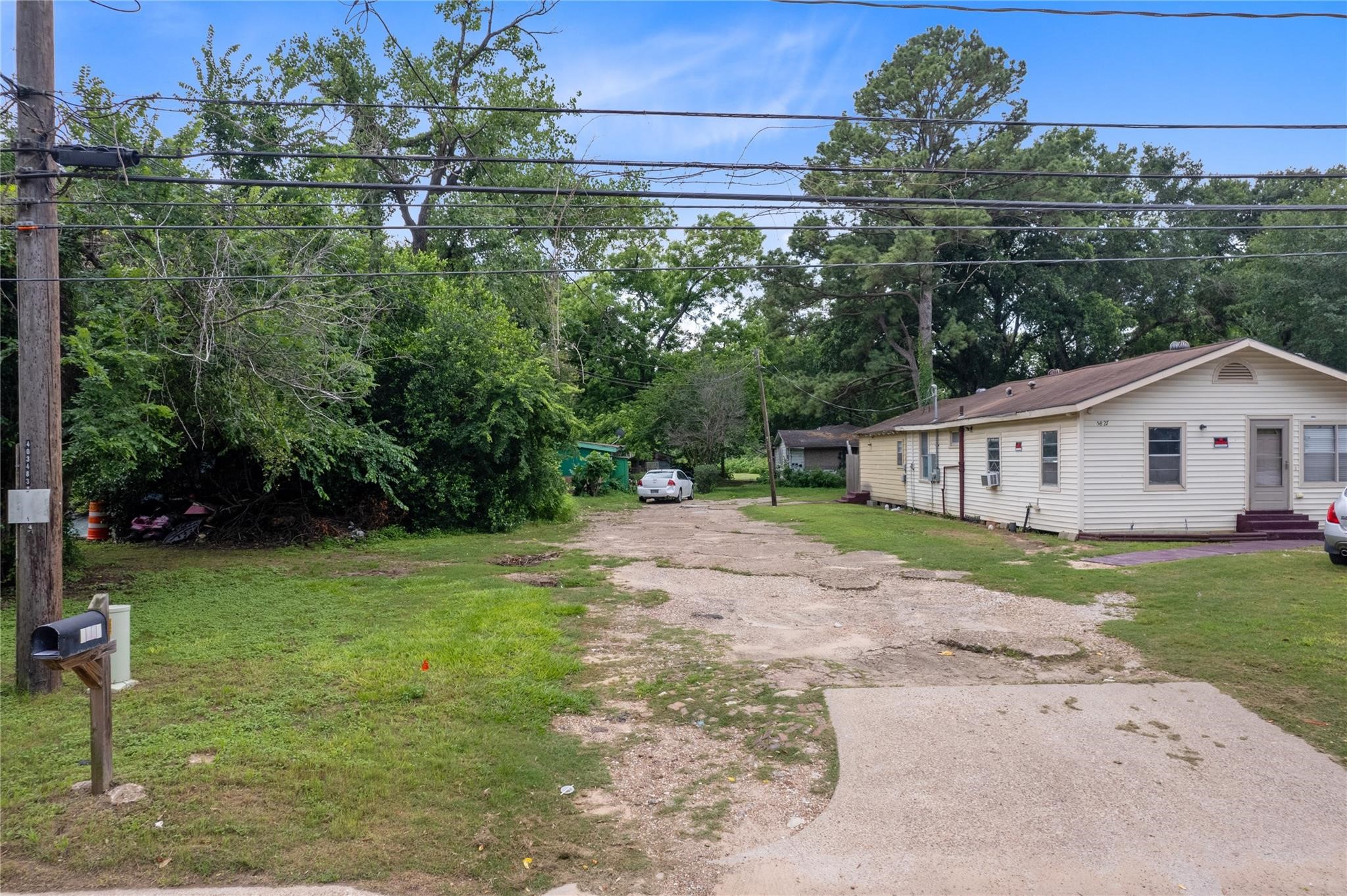 5821 Roberts Road Katy, TX 77494 - Photo 3 of 6 a view of a house with backyard and garden
