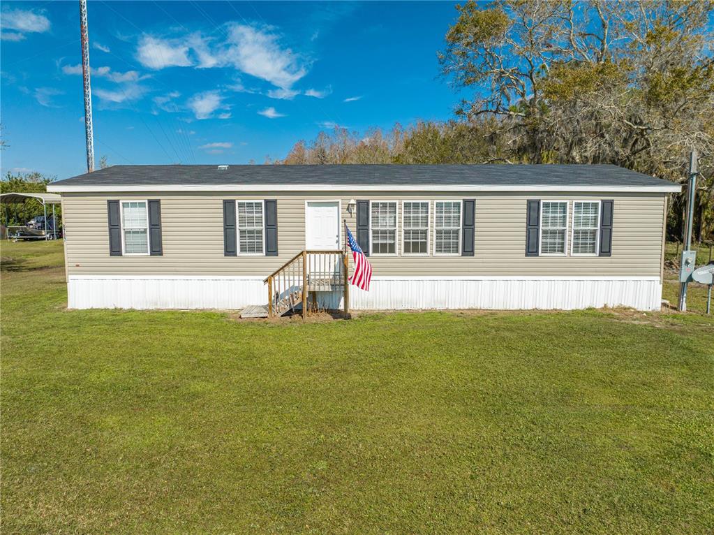 8797 Holopaw Groves Road St. Cloud, FL 34773 - Photo 1 of 1 Front of home