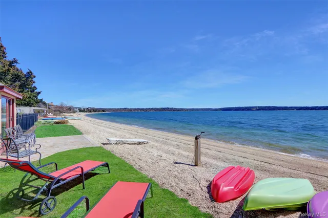 a view of a yard with swimming pool and outdoor seating