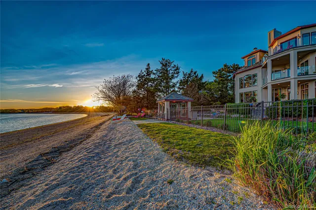 a view of a yard next to a building