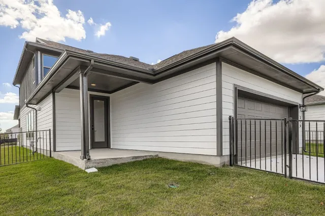 a backyard of a house with lots of green space