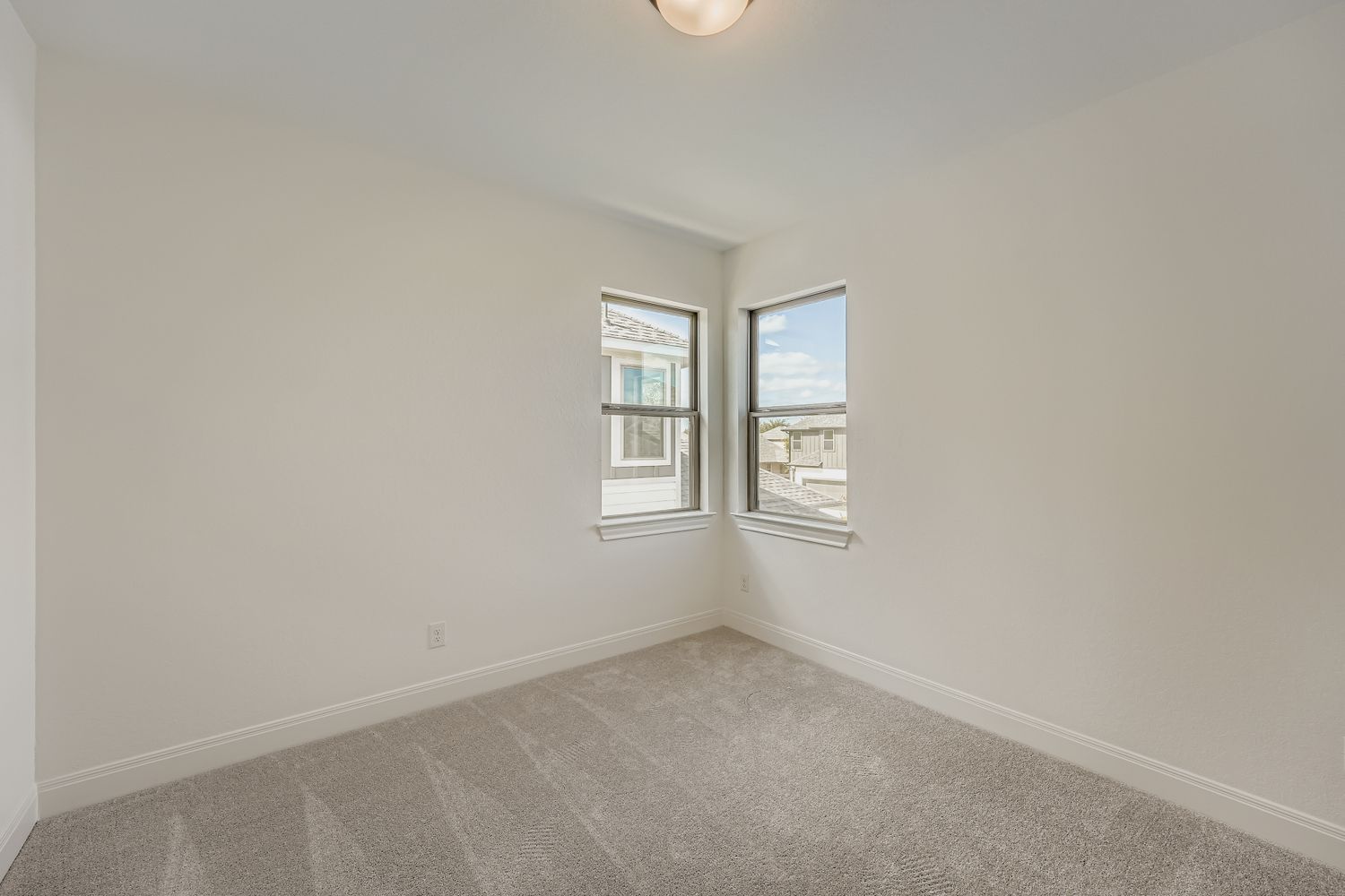376 Orleanian Drive Buda, TX 78610 - Photo 8 of 10 an empty room with windows