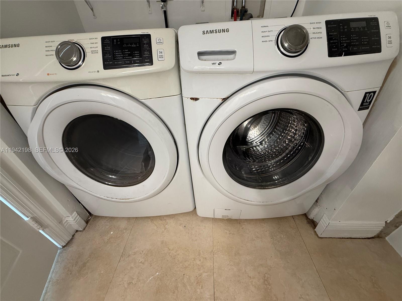 15460 Southwest 284th Street, Unit 4102 Homestead, FL 33033 - Photo 19 of 19 a utility room with dryer and washer