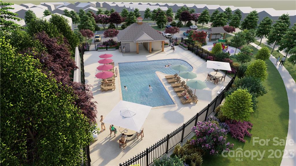 1244 Maple Shade Road Southwest, Unit 73 Concord, NC 28027 - Photo 12 of 12 an aerial view of a house with yard swimming pool and outdoor seating