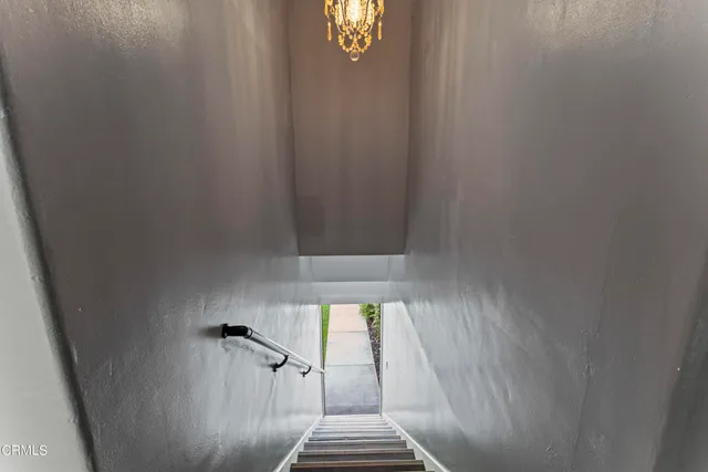 a bathroom with a toilet a sink and a shower