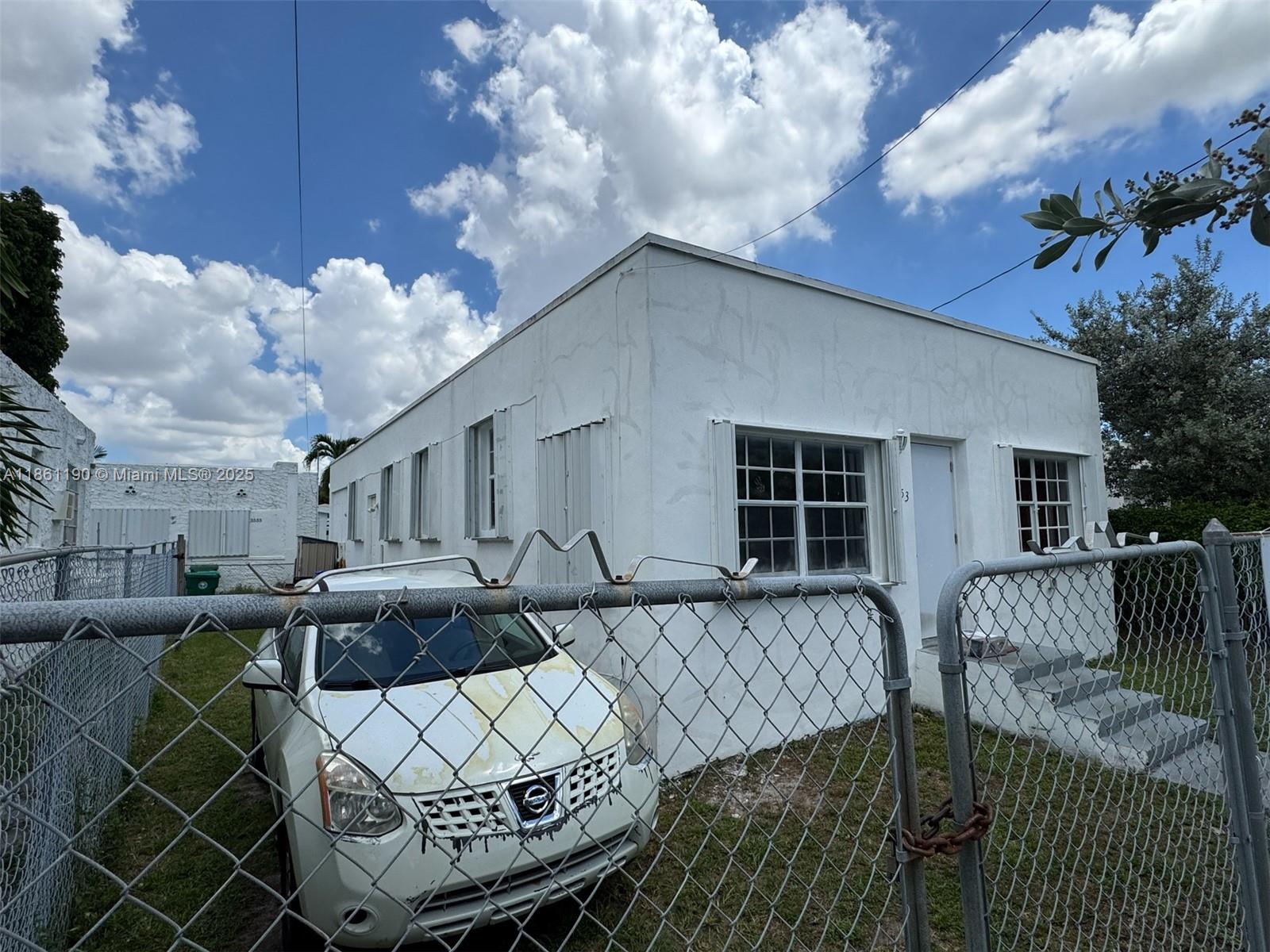 3553 Southwest 14th Street Miami, FL 33145 - Photo 11 of 12 a view of a house with backyard and sitting area